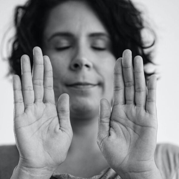 Woman beaming Reiki